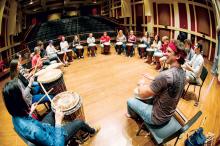 Students in a drum circle