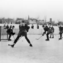Hockey action ca. 1937 or 38 at the rink near Dean Eaton Residence.